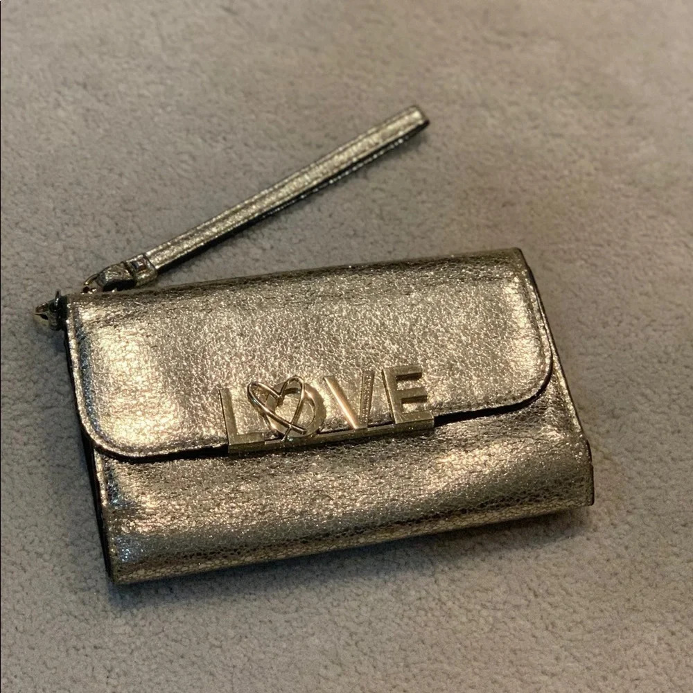 VICTORIA’S Secret shimmer phone wallet, golden